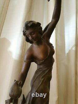 Ancient Statue In Regule Art Deco Woman To Flower