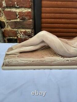 Art Deco ODYV faience statue. Woman lying with kid