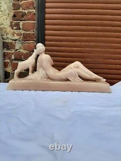 Art Deco ODYV faience statue. Woman lying with kid