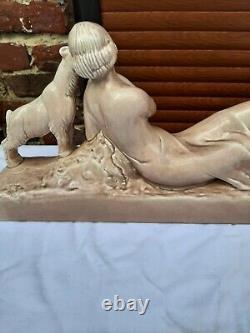 Art Deco ODYV faience statue. Woman lying with kid