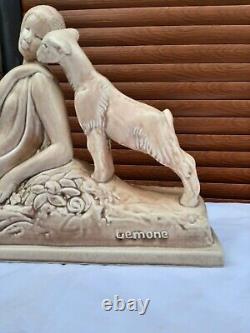 Art Deco ODYV faience statue. Woman lying with kid