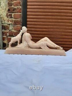 Art Deco ODYV faience statue. Woman lying with kid