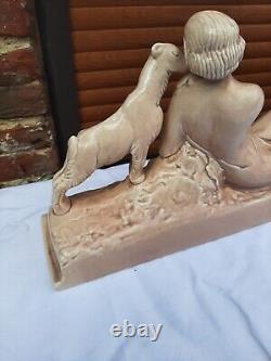 Art Deco ODYV faience statue. Woman lying with kid