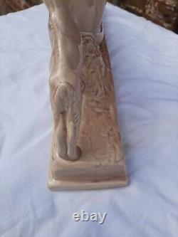 Art Deco ODYV faience statue. Woman lying with kid