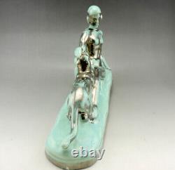 Art Deco ODYV statue in ceramic naked woman with panther pale green silver gradation