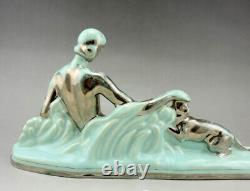 Art Deco ODYV statue in ceramic naked woman with panther pale green silver gradation