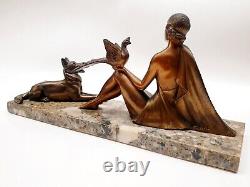 Art Deco Regule Sculpture Woman with Bird and Dog signed H. BAL BALLESTE