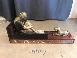 Art Deco Statue of Woman and Her Dog in Regule on Marble Base from the 1930s