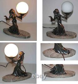 Art Deco lamp in spelter and marble woman holding a globe