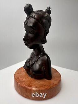 Bust of Africanist woman in Art Deco style in rosewood and marble