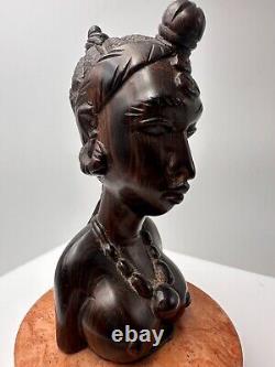 Bust of Africanist woman in Art Deco style in rosewood and marble