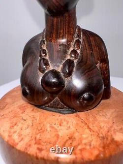 Bust of Africanist woman in Art Deco style in rosewood and marble