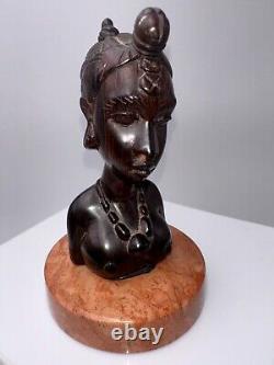 Bust of Africanist woman in Art Deco style in rosewood and marble