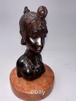 Bust of Africanist woman in Art Deco style in rosewood and marble