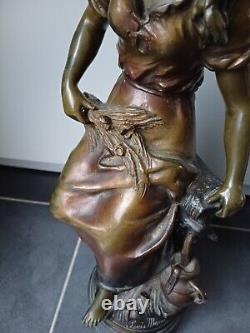 Louis Moreau. Regulator. Art Deco Woman Statue