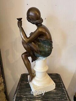 Sculpture of a Woman in Bronze Art Deco Style on White Stone Base Early 20th Century