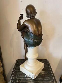 Sculpture of a Woman in Bronze Art Deco Style on White Stone Base Early 20th Century