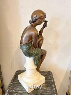 Sculpture of a Woman in Bronze Art Deco Style on White Stone Base Early 20th Century