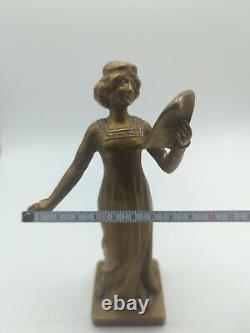 Statue, Art Deco bronze sculpture of a signed woman by H. Poirier