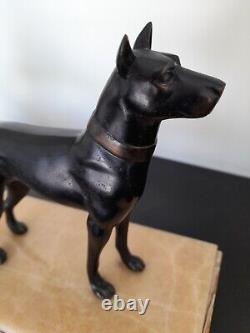 Woman with dog. Art Deco sculpture in spelter on a marble base