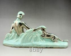 Art Déco ODYV statue en faiencefemme nue au panthèrecamaïeu vert pâle argenté