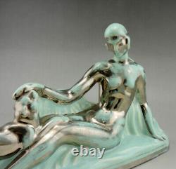 Art Déco ODYV statue en faiencefemme nue au panthèrecamaïeu vert pâle argenté