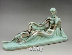 Art Déco ODYV statue en faiencefemme nue au panthèrecamaïeu vert pâle argenté