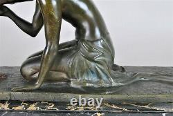 J Lormier, Femme assise au lévrier, bronze art déco signé, XXème siècle