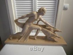 Salvatore MELANI (1902-1934) Sculpture art deco plâtre patiné Femme au lévrier