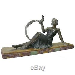 Statue Art-Déco en bronze argenté femme au faisan socle en marbre L = 48 cm